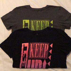 Two small Nike tees